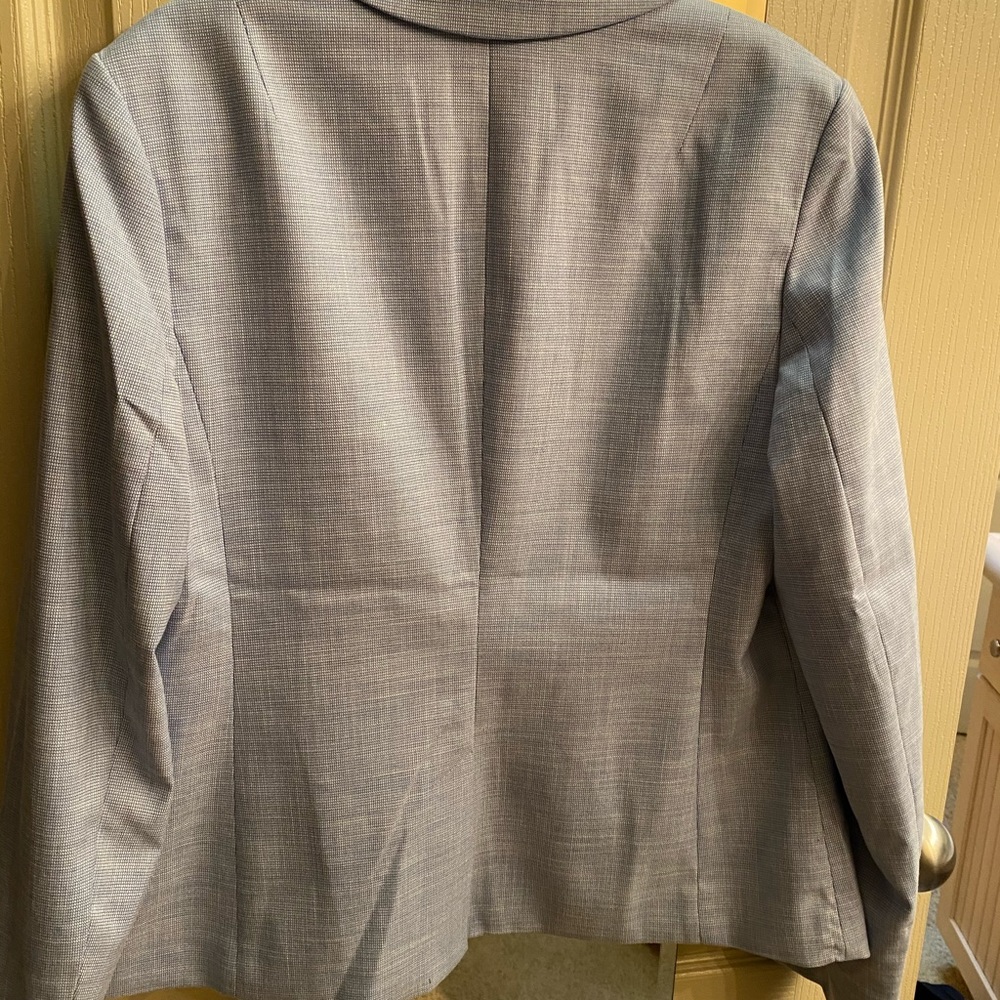 Women’s blue suit jacket